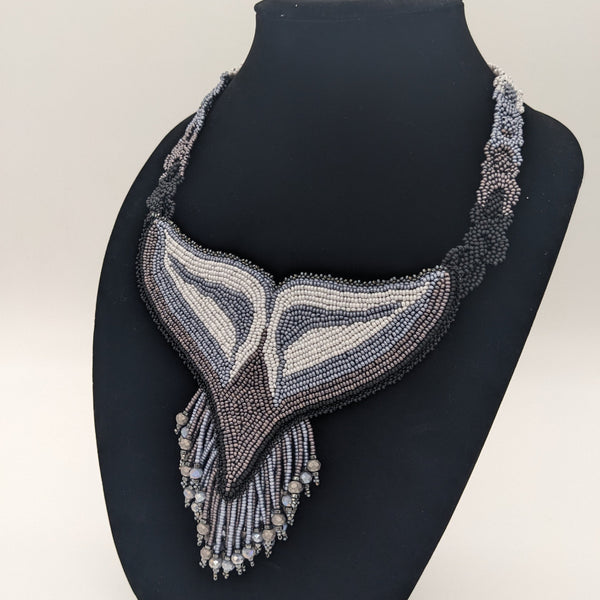 A Dolphin's Tail Necklace