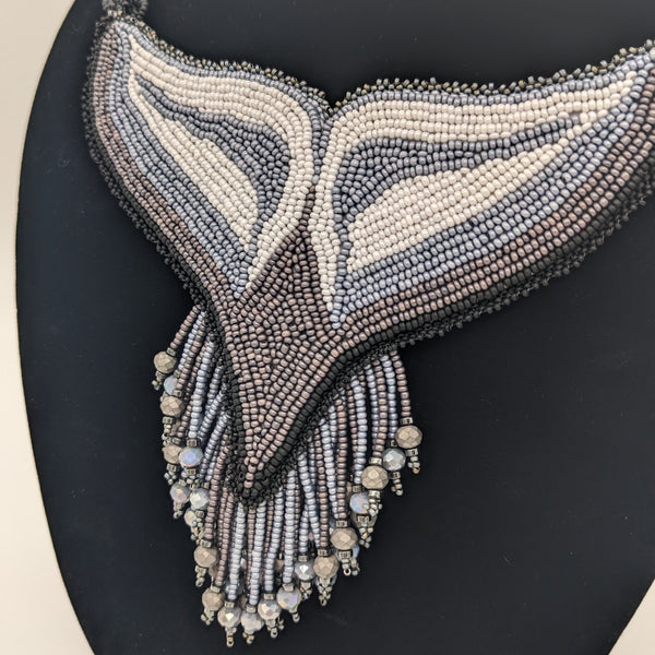 A Dolphin's Tail Necklace