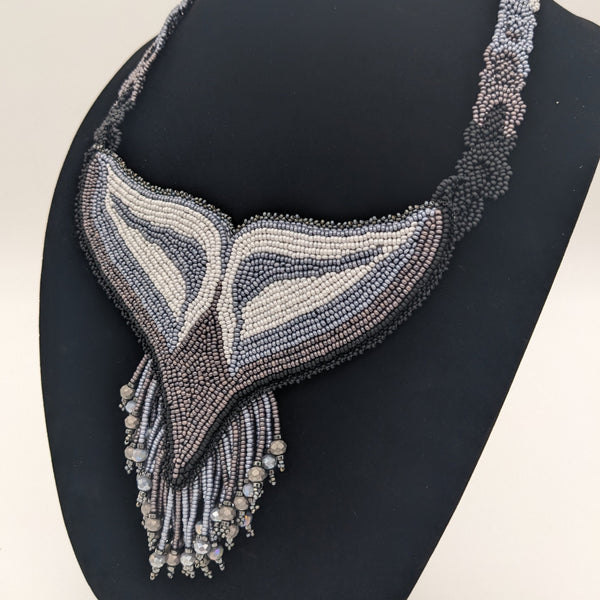 A Dolphin's Tail Necklace