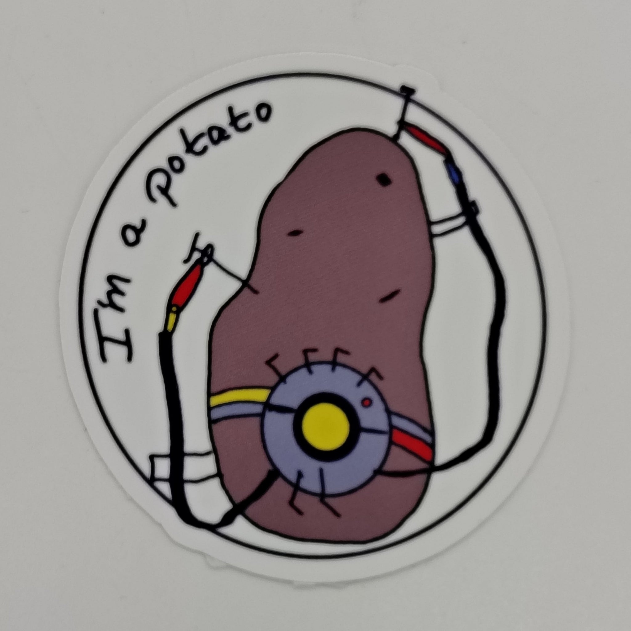 An image of a potato with electrical components featuring the words 'i'm a potato'