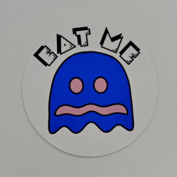 Sticker featuring a vulnerable pacman ghost and the words eat me