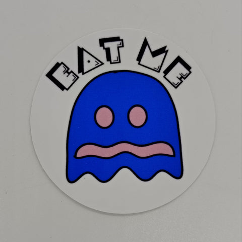 Sticker featuring a vulnerable pacman ghost and the words eat me