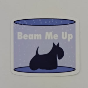 the silhouette of a Scottish terrier on a transporter with the words 'Beam Me Up'