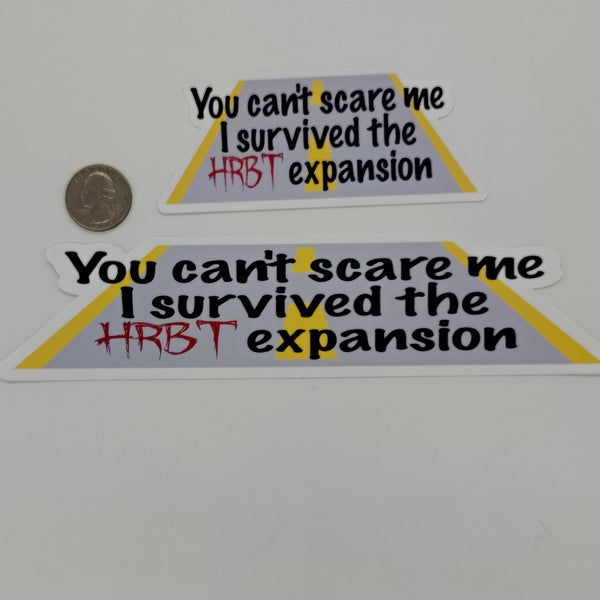 a sticker that says 'you can't scare me I survived the HRBT expansion' over a graphic of a road