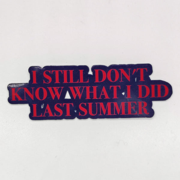 a sticker that says 'i still don't know what i did last summer' in red text on a black background