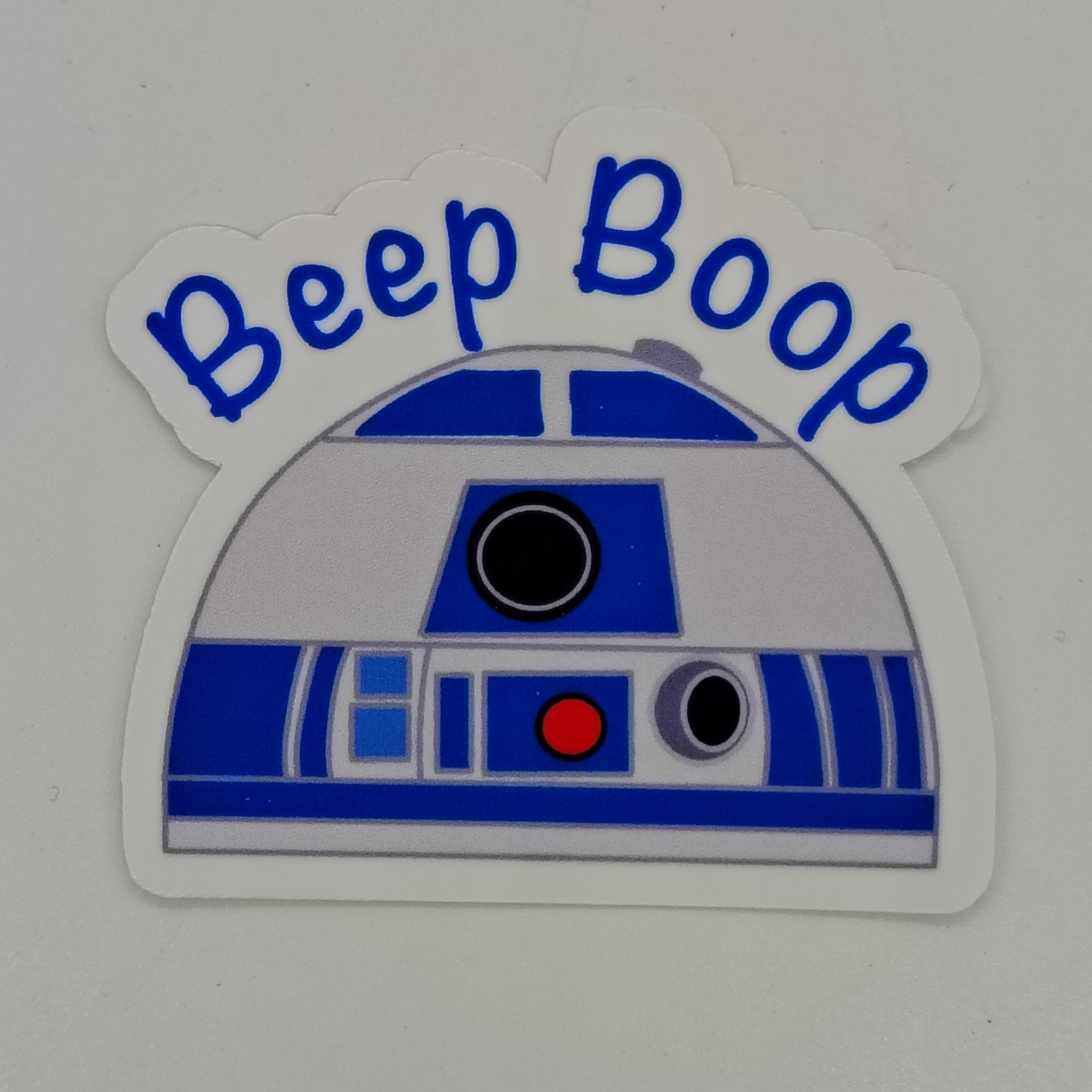 the top of r2d2 with the words 'beep boop'