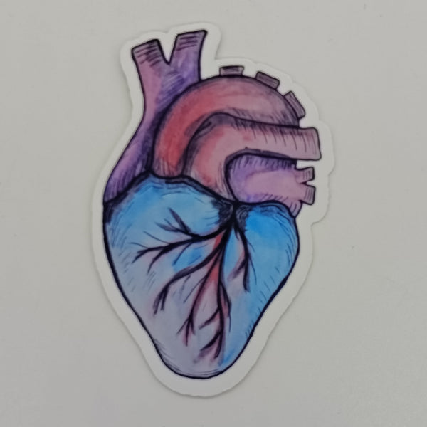 a sticker of a watercolor heart in blue, red and purple